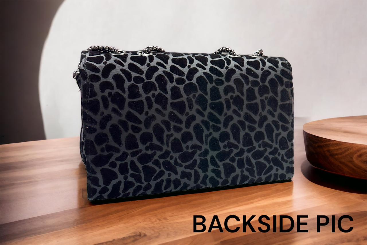 Wild Elegance: Cheetah Print Black Chain Handle Sling Bag